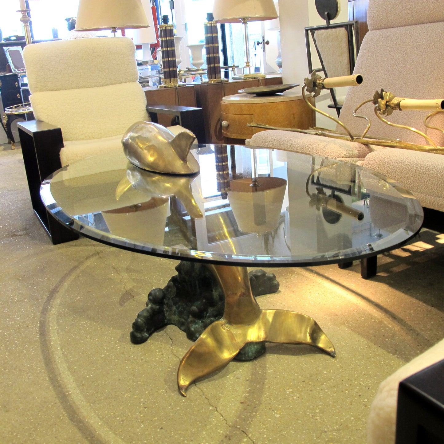 1960s French Brass Coffee Table in the shape of a Dolphin with an Oval Glass Top