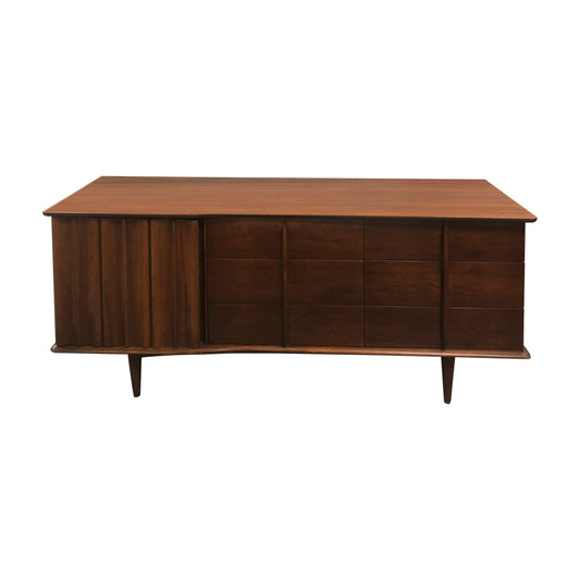 A Brutalist walnut sculptural credenza, mid century modern, American