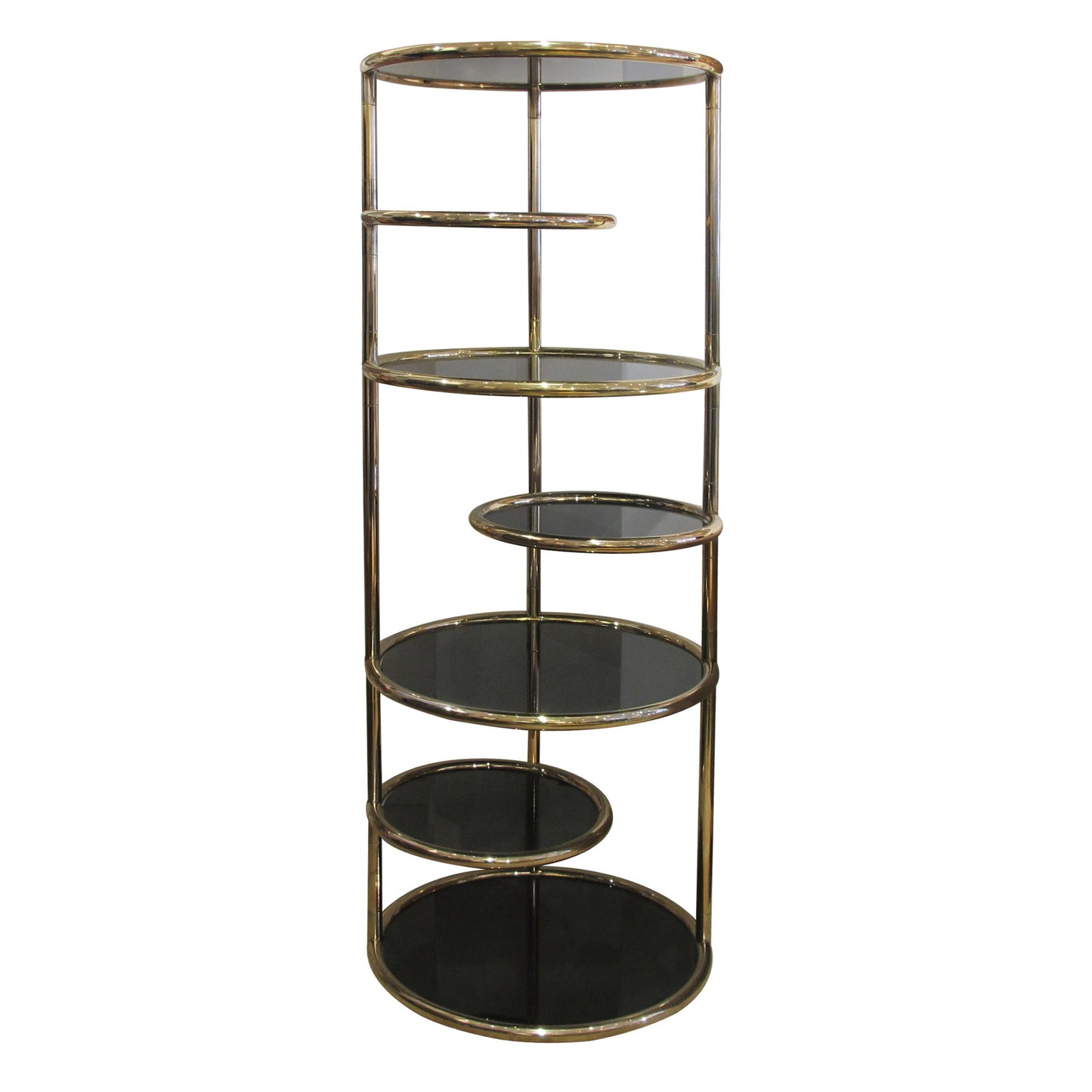 A 1970's circular tall shelving unit