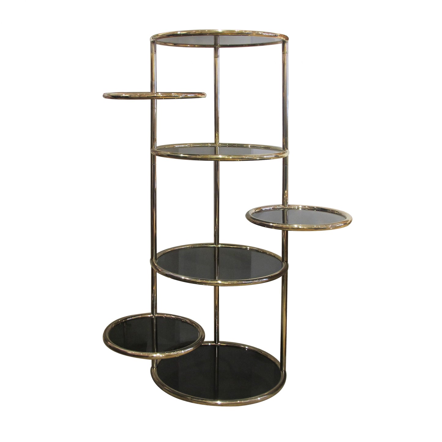 A 1970's circular tall shelving unit