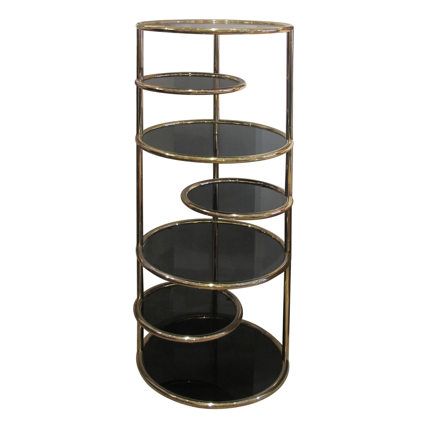 A 1970's circular tall shelving unit