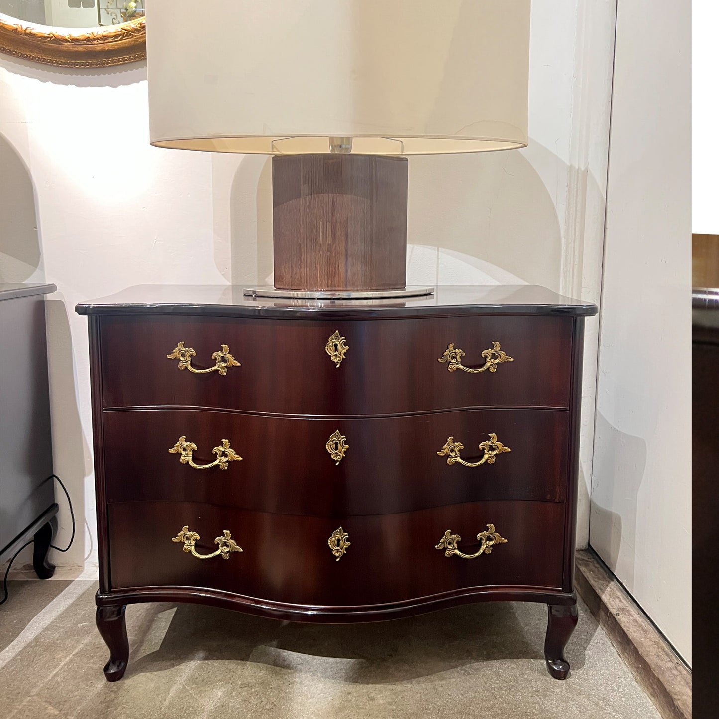 Pair of 1950s Bow-Fronted Swedish Mahogany Chests of Drawers with Brass Accents