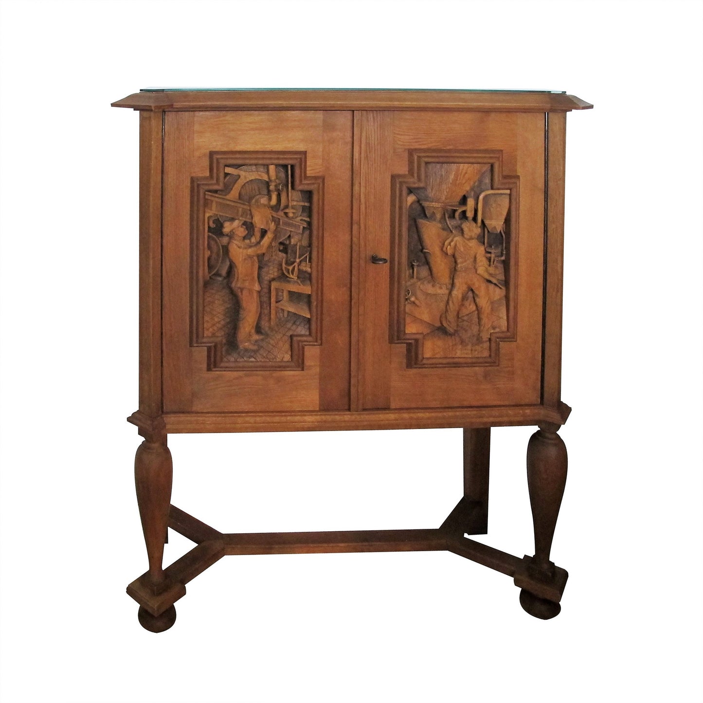 A 1940’s oak cabinet with carvings by E. Hallanvaara, Finnish