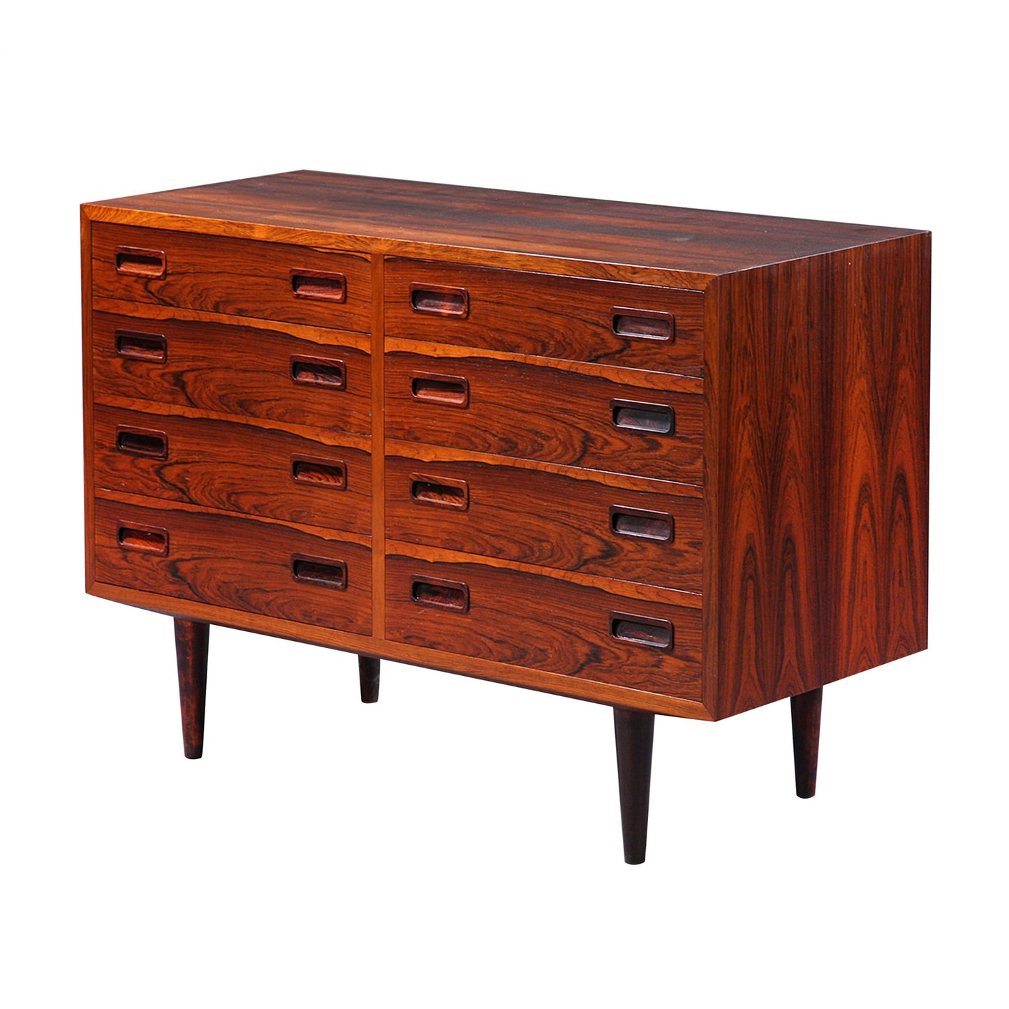 A mid century Danish rosewood chest of drawers