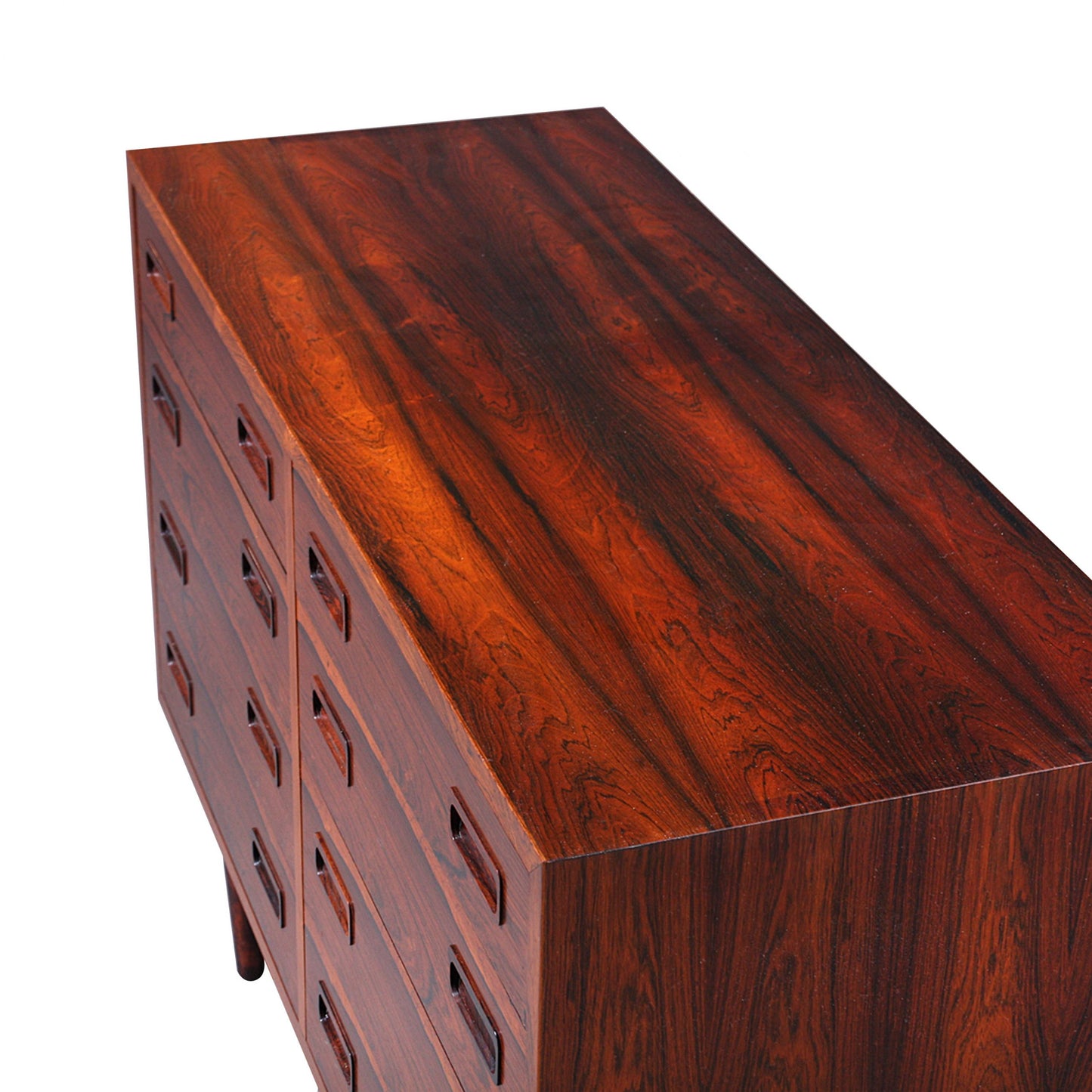 A mid century Danish rosewood chest of drawers