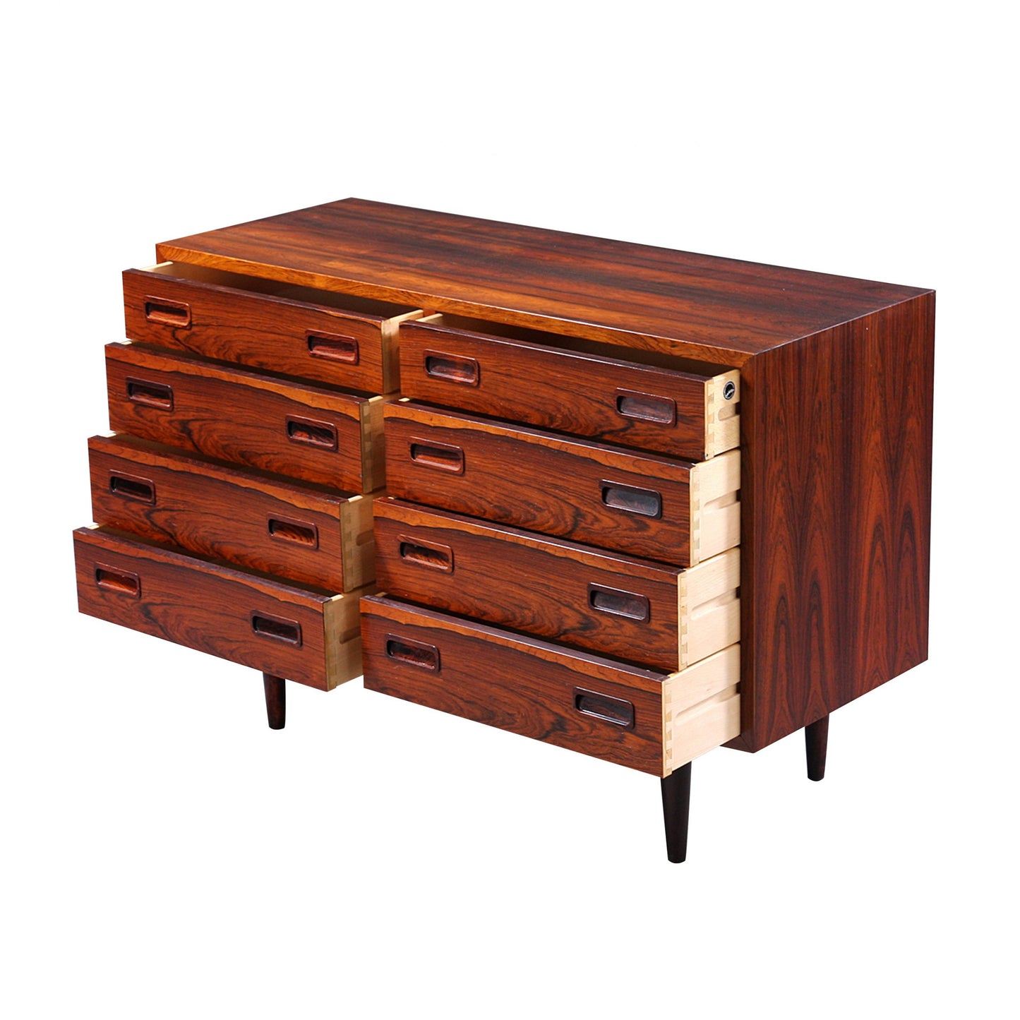 A mid century Danish rosewood chest of drawers