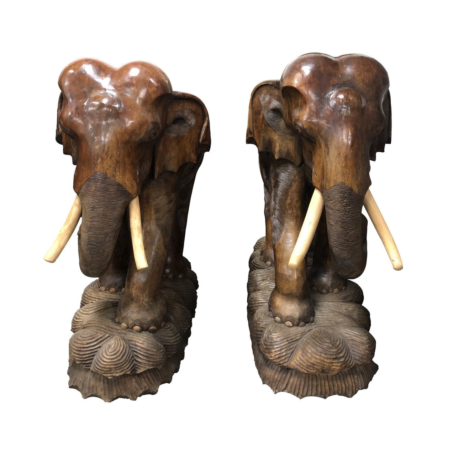 A pair of carved wood elephants sculptures, 20th century