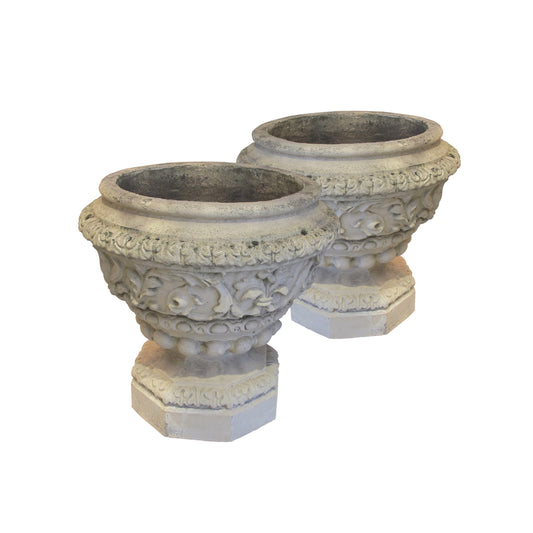 A pair of Victorian white terracotta urns