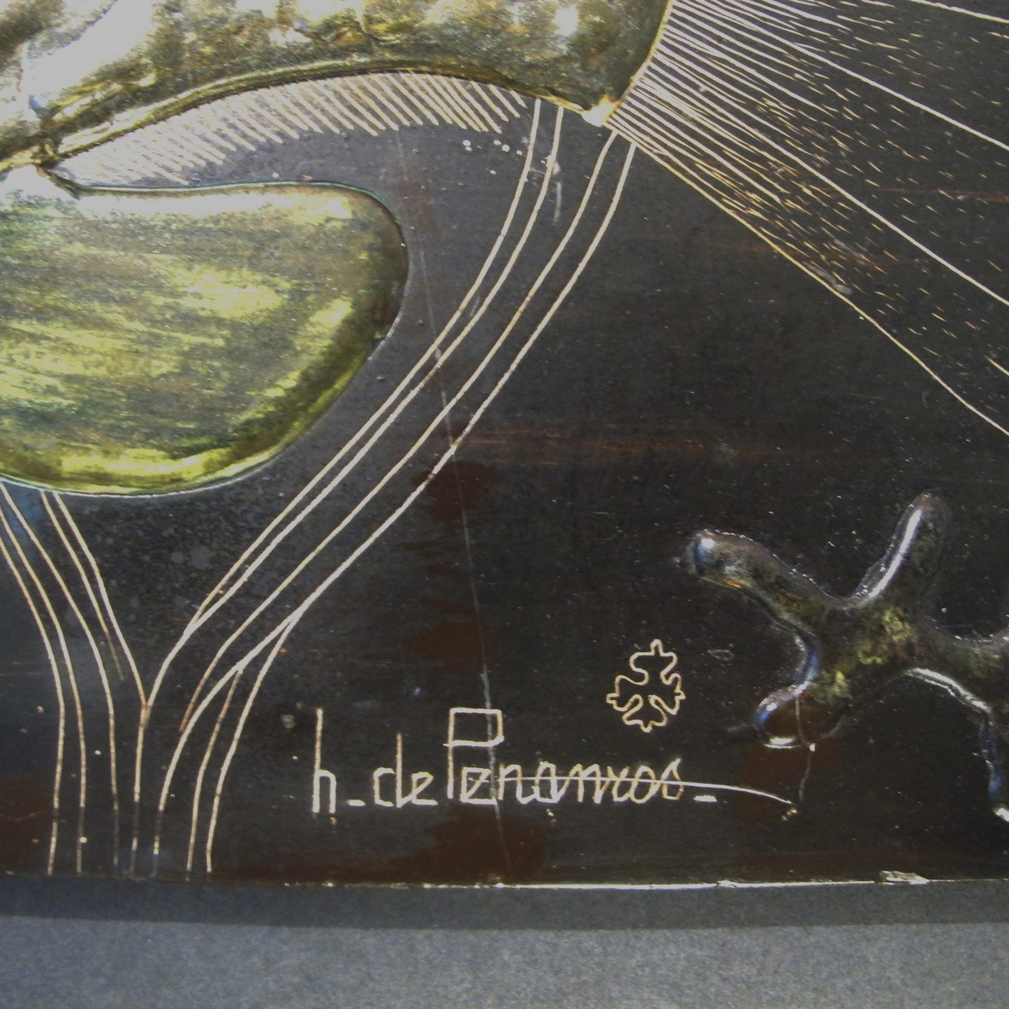 A painted wall plaster relief of fish underwater by H. De Penanros