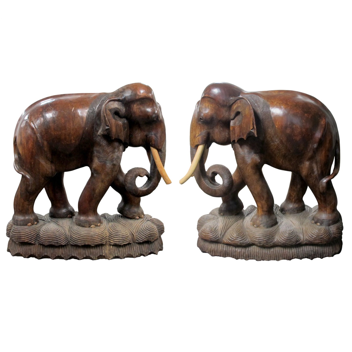 A pair of carved wood elephants sculptures, 20th century