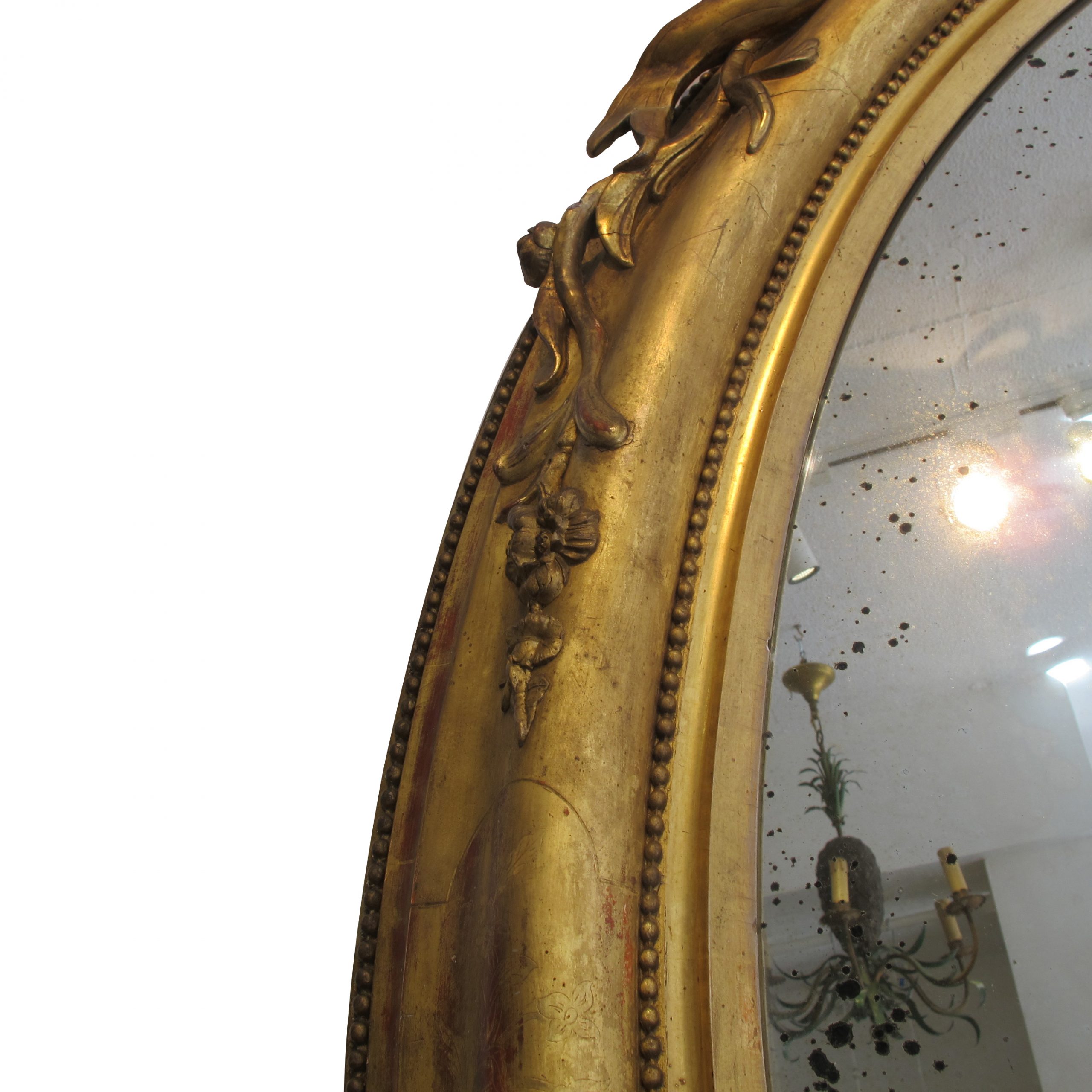 French Oval Gilt Mirror with Bow Crest, 1860